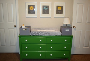 the dresser/changing table.  we painted our old dresser this fun kelly green color.
