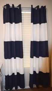 color block curtains- we bought navy curtains for cheap at IKEA and I added the white stripes.